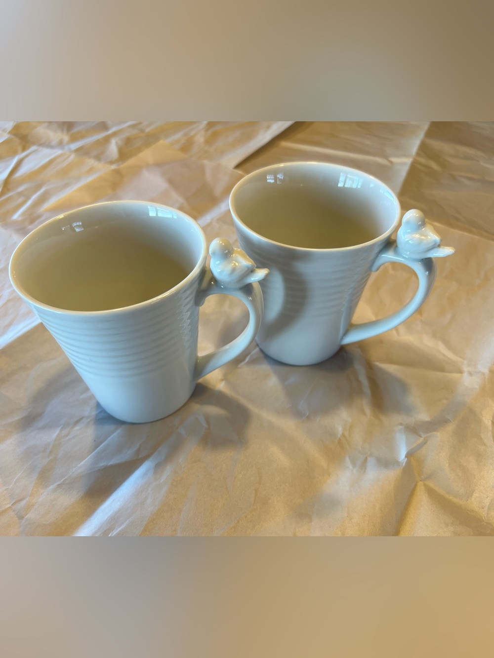 Elegant White Ceramic Mugs with Bird Accent - Set of 2